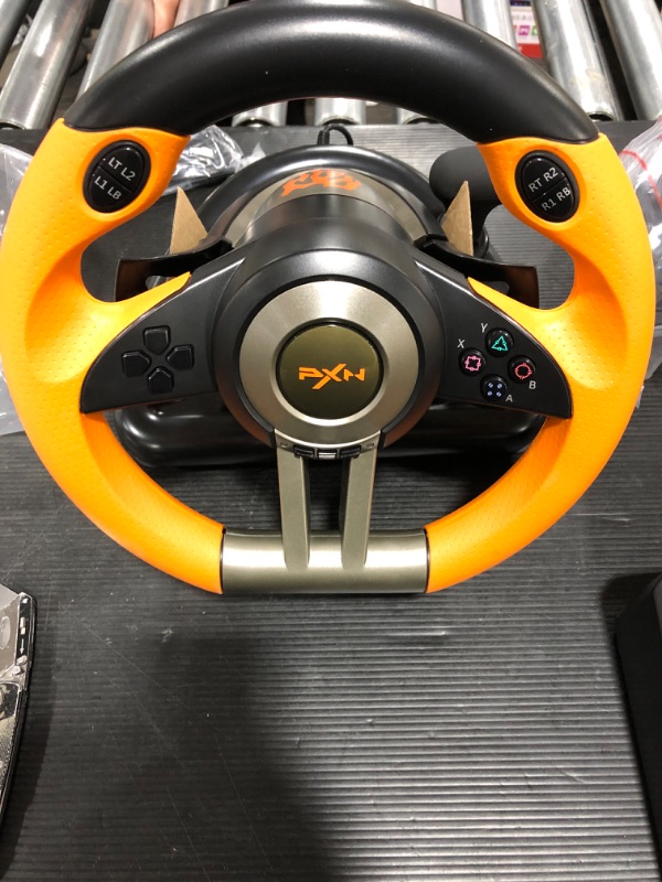 Photo 2 of Game Racing Wheel, PXN-V3II 180° Competition Racing Steering Wheel with Universal USB Port and with Pedal, Suitable for PC, PS3, PS4, Xbox One, Xbox Series S&X, Nintendo Switch - Orange