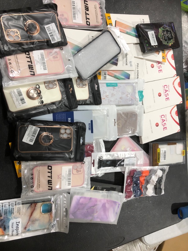 Photo 1 of BAG LOT MISC PHONE CASES, SCREEN PROTECTORS, WATCH BANDS AND CORD HOLDERS