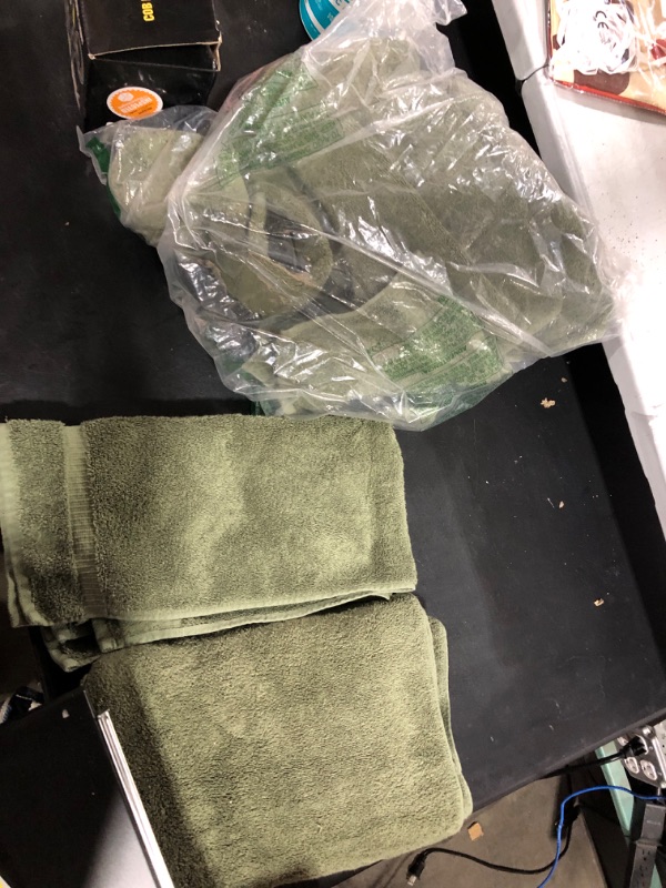 Photo 1 of 2 sets of bathroom green towels 