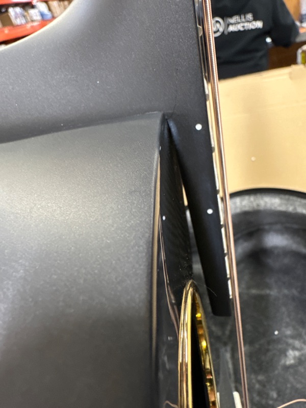 Photo 3 of Enya Carbon Fiber Acoustic Electric Guitar X4 Pro AcousticPlus 41” Cutaway Guitar Bundle with Hard Case, Leather Strap(EA-X4E Pro)
minor damage - small dent on edge