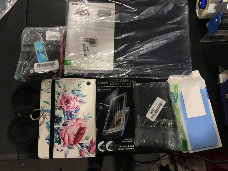 Photo 1 of Phone and Tablet Case Bundle 