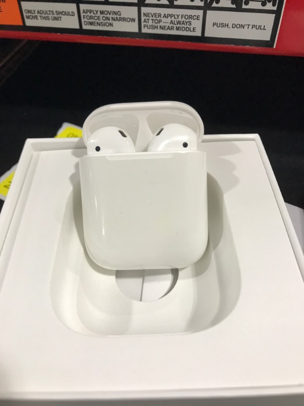 Photo 2 of Apple AirPods with Charging Case (Latest Model)