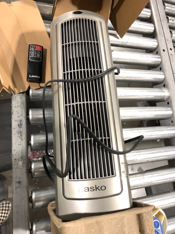 Photo 1 of Lasko 1500W Digital Ceramic Space Heater with Remote, 755320, Silver