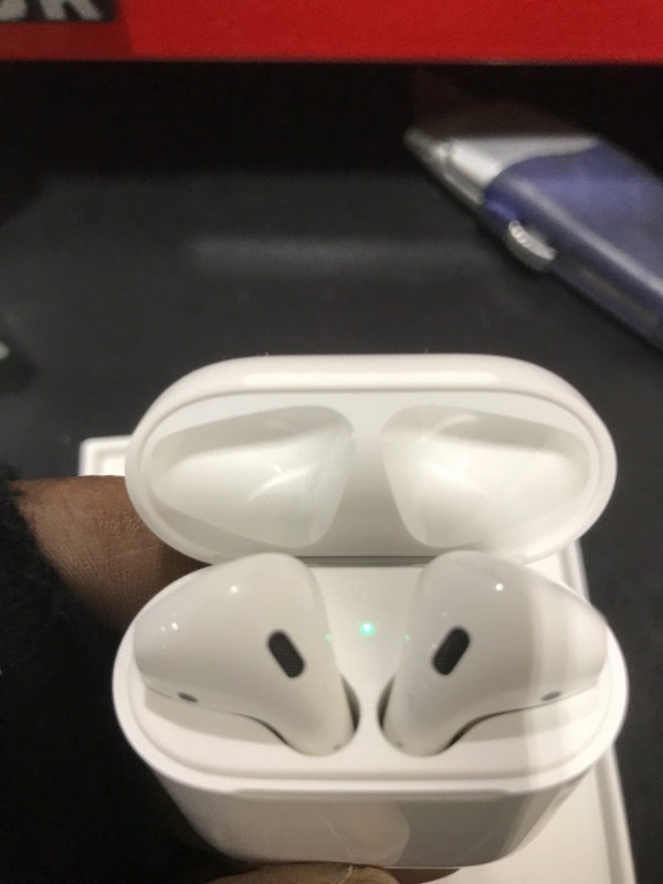 Photo 2 of Apple AirPods with Charging Case (Latest Model)