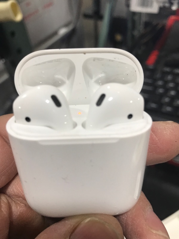 Photo 2 of Apple AirPods with Charging Case (Latest Model)