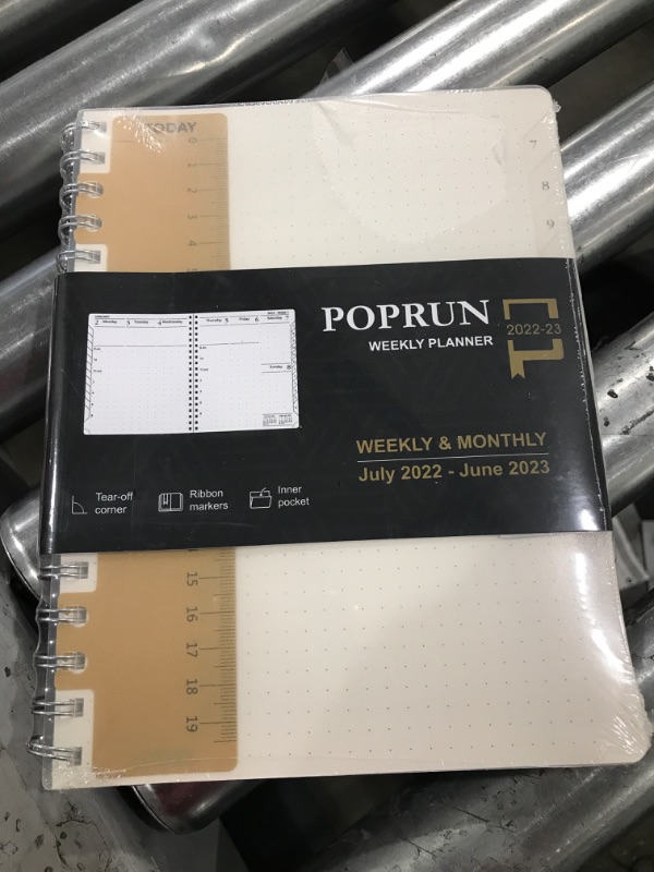 Photo 1 of Essentials Weekly Planner 2022-2023, POPRUN Daily Monthly Calendar Agenda 6.5'' x 8.5'', Vertical Academic Year July 2022 - June 2023 Simplified Bullet Dotted Journal with Transparent Plastic Cover Medium-6.5 x 8.5