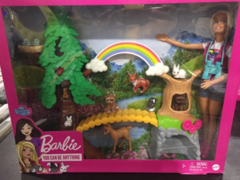 Photo 2 of Barbie Wilderness Guide Interactive Playset with Blonde Barbie Doll (12-in), Outdoor Tree, Bridge, Overhead Rainbow, 10 Animals