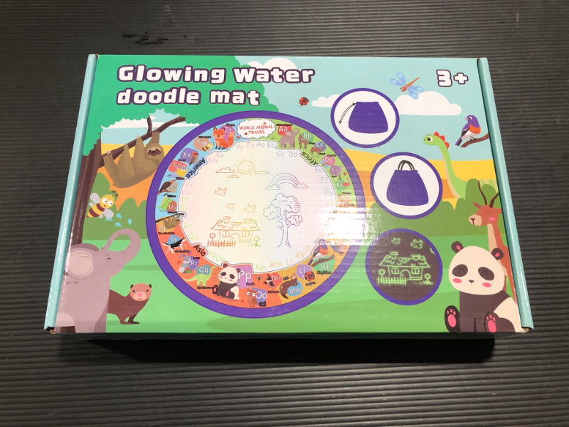 Photo 2 of Gemeer Magic Water Doodle Mat - 40 Inch Extra Large Glowing Drawing Mat with Storage Function - Kids Painting Writing Learning Coloring Pad - Christmas Gift Educational Toys for 3+ Boys Girls