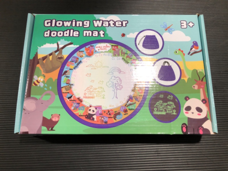 Photo 1 of Gemeer Magic Water Doodle Mat - 40 Inch Extra Large Glowing Drawing Mat with Storage Function - Kids Painting Writing Learning Coloring Pad - Christmas Gift Educational Toys for 3+ Boys Girls