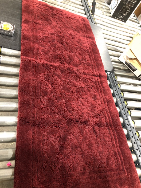 Photo 1 of 56" X 24" BURGANDY BATHROOM RUG