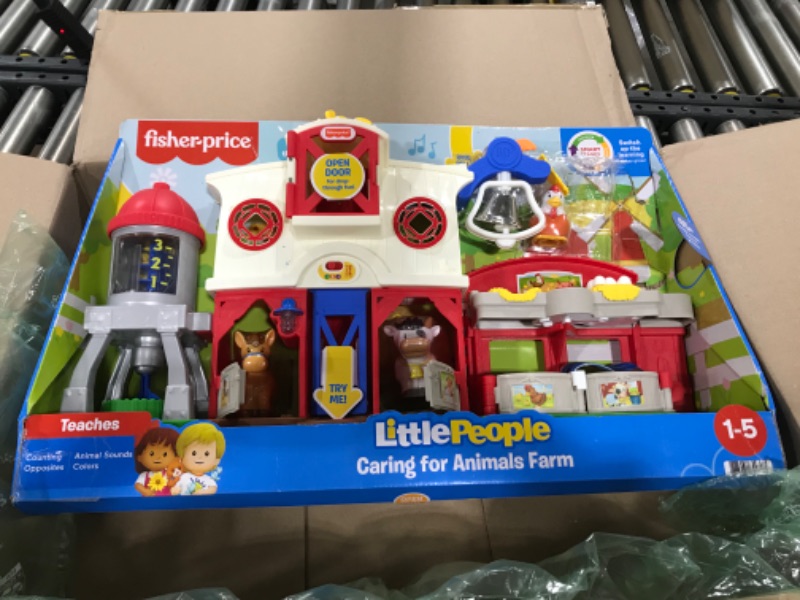 Photo 2 of Fisher-Price Little People Farm Toy, Toddler Playset with Lights Sounds and Smart Stages Learning Content, Caring for Animals Farm? Standard