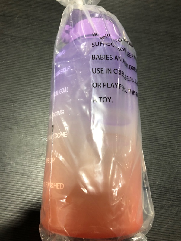 Photo 1 of 128OZ MOTIVATIONAL WATER BOTTLE PURPLE AND ORANGE 