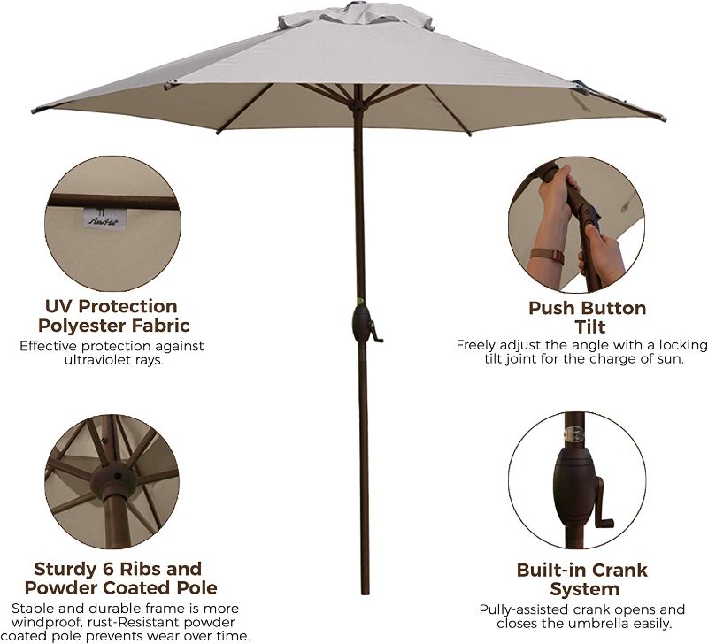 Photo 1 of Abba Patio 9ft Patio Umbrella Outdoor Umbrella Market Table Umbrella with Push Button Tilt and Crank for Garden, Lawn, Deck, Backyard & Pool, Cream
