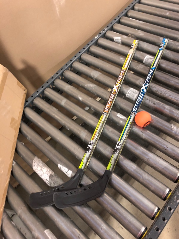 Photo 2 of Franklin Sports NHL Kids Street Hockey Stick Set - Includes (2) Youth Street Hockey Sticks + (1) Outdoor Roller Hockey Ball - Perfect Hockey Starter Set for Kids
