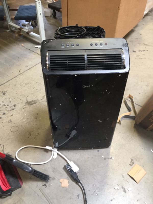 Photo 7 of Midea Duo 12,000 BTU (10,000 BTU SACC) HE Inverter Ultra Quiet Portable Air Conditioner, Cools up to 450 Sq. Ft., Works with Alexa/Google Assistant, Includes Remote Control & Window Kit
