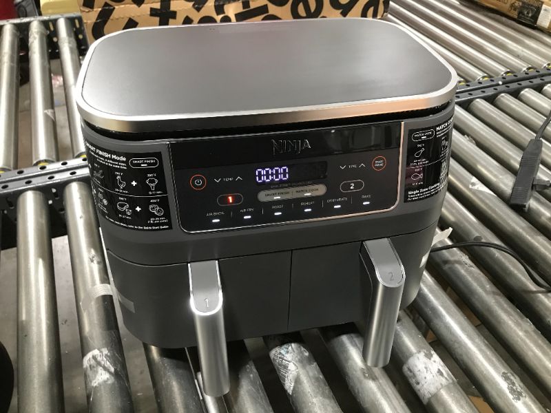 Photo 2 of Ninja DZ201 Foodi 8 Quart 6-in-1 DualZone 2-Basket Air Fryer with 2 Independent Frying Baskets, Match Cook & Smart Finish to Roast, Broil, Dehydrate & More for Quick, Easy Meals, Grey
