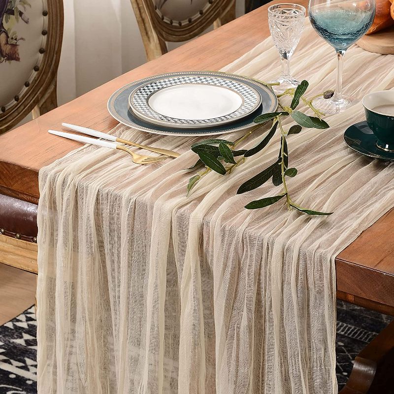 Photo 1 of Avendo Cheesecloth Gauze Rustic Table Runner – 30 x 120 Inches Long and Romantic Style - Perfect for Wedding Décor, Parties, Bridal/Baby Showers. (Ivory Nude)
