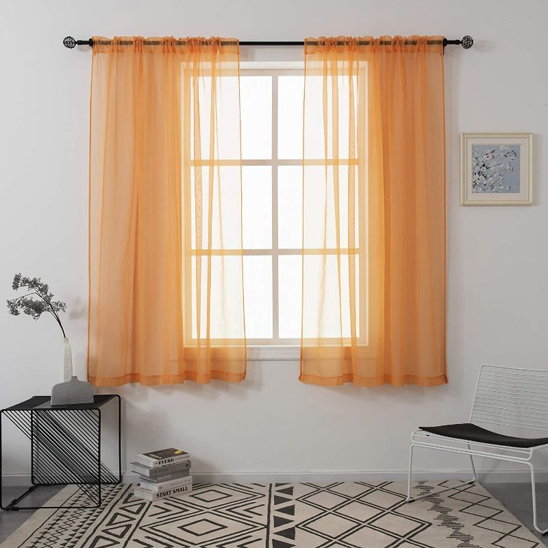 Photo 1 of N&F 2 pc Sheer Voile Curtains Draperies - Window Treatment Rod Pocket Light Filtering Curtains Drapes Panels for Bedroom Living Room Party Backdrop, Orange Yellow, 52 Inch by 54 Inch
