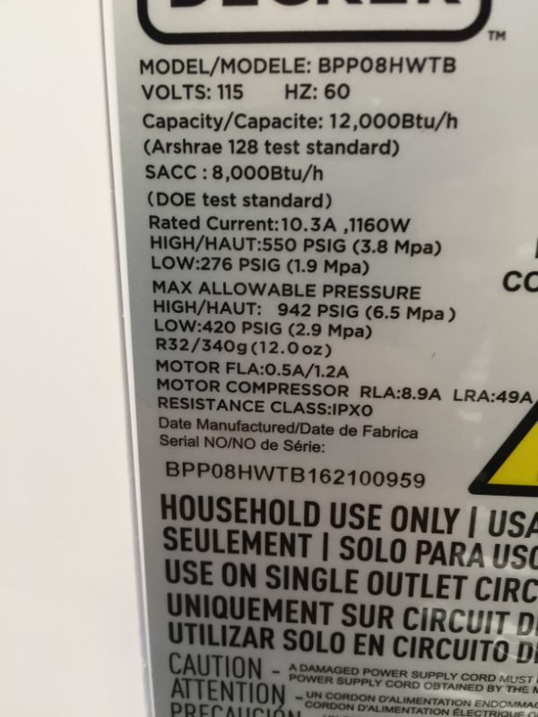 Photo 6 of BLACK+DECKER 12,000 BTU Portable Air Conditioner with Heat and Remote Control, White------missing item like controller and other items 
