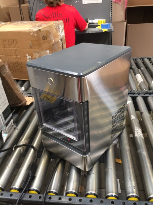 Photo 7 of GE Profile Opal | Countertop Nugget Ice Maker with Side Tank | Portable Ice Machine Makes up to 24 lbs. of Ice Per Day | Stainless Steel Finish----VERY USED ----HAS A DENT ON THE SIDE 
