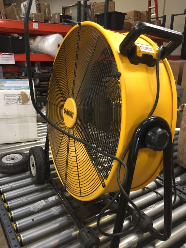 Photo 3 of DEWALT DXF-2490 High-Velocity Industrial, Drum, Floor, Barn, Warehouse Fan, Heavy Duty Air Mover with Adjustable Tilt & Large Wheel, 24", Yellow------WORKS FIN -----IT DOES HAVE A BROKEN BACK WHEEL VIEW PICTURES FOR REFERENCE 
