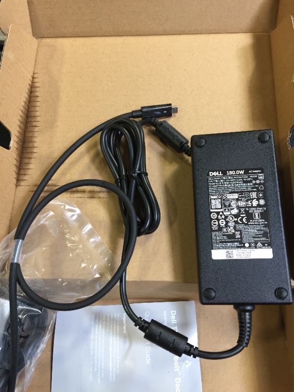 Photo 2 of Dell WD19TBS 180W Computer Docking Station (Thunderbolt, USB-C/A, DisplayPort, RJ45 Ports) (210-AZBI) DAMAGES TO BOX FROM EXPOSURE 