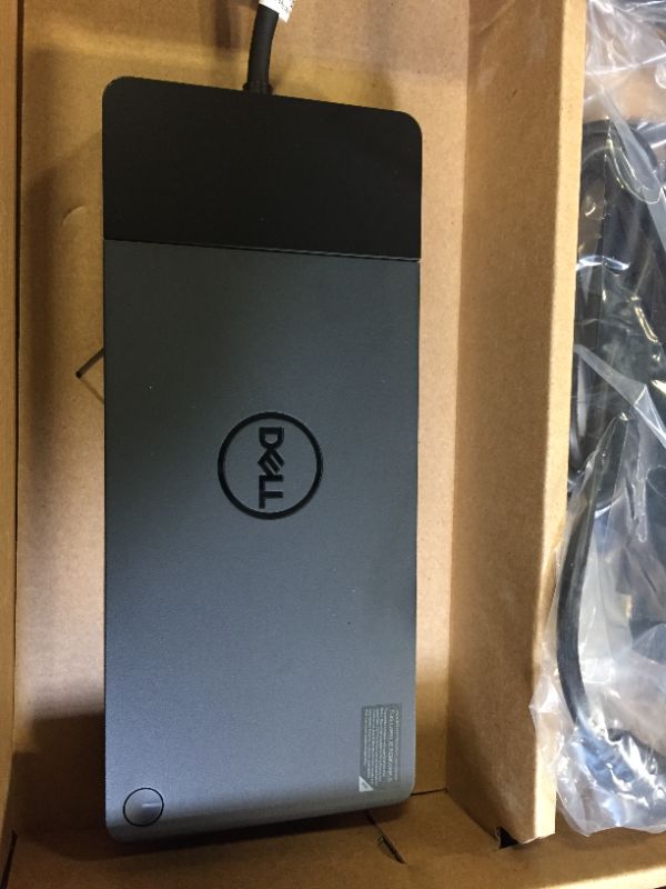 Photo 3 of Dell WD19TBS 180W Computer Docking Station (Thunderbolt, USB-C/A, DisplayPort, RJ45 Ports) (210-AZBI) DAMAGES TO BOX FROM EXPOSURE 