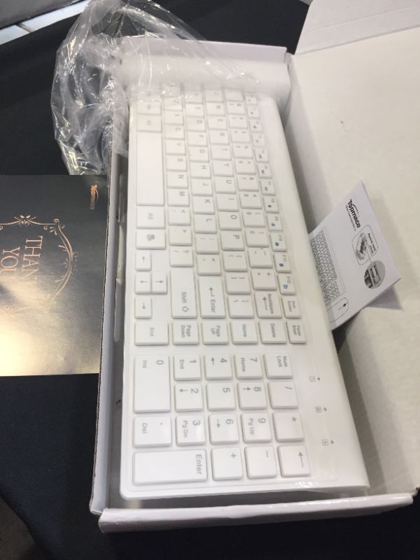 Photo 2 of TopMate Portable Wireless Keyboard Black%EF%BC%8CWhite