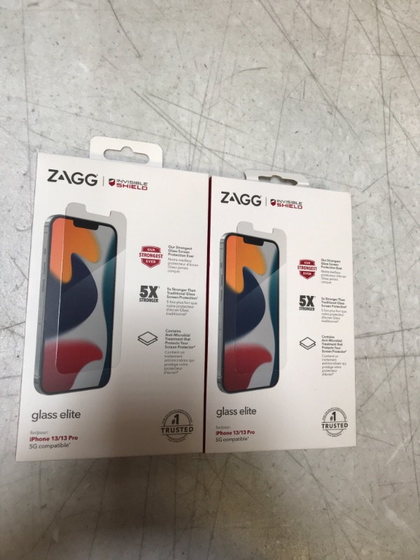 Photo 2 of ZAGG InvisibleShield Glass Elite Screen Protector for Apple iPhone 13 Pro (6.1 inch screen), 5X Shatter Protection, Anti-Microbial Treatment, Anti-Fingerprint Technology, Easy to Install. 2 COUNT 
