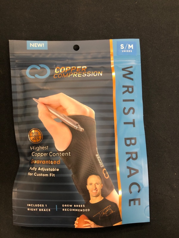 Photo 2 of Copper Compression Recovery Wrist Brace - Copper Infused Adjustable Support Splint for Pain