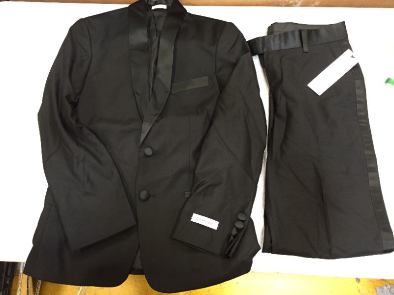Photo 2 of Calvin Klein Boys' 2-Piece Formal Tuxedo Suit Set, Includes Jacket & Dress Pants, Satin Trim Detailing & Functional Pockets
size 14