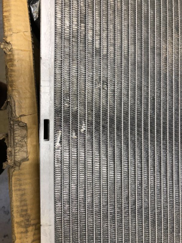 Photo 2 of Automotive radiator---------has a few damages---------