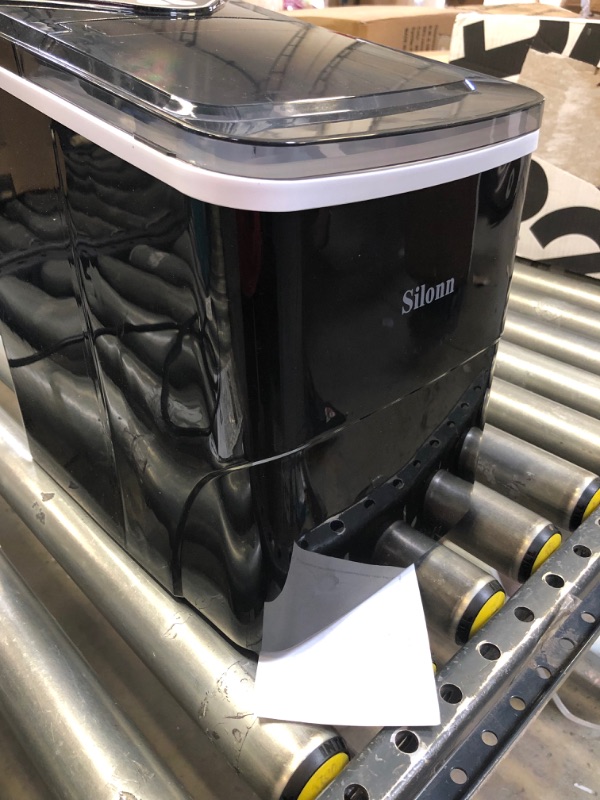 Photo 1 of Silonn Ice Makers Countertop, 9 Cubes Ready in 6 Mins, 26lbs in 24Hrs, Self-Cleaning Ice Machine with Ice Scoop and Basket, 2 Sizes of Bullet Ice for Home Kitchen Office Bar Party----inside of the ice maker needs to cleaned due to usage