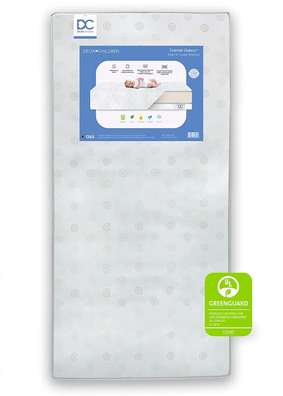 Photo 1 of Delta Children Twinkle Galaxy Dual Sided Crib and Toddler Mattress -******MINOR DAMAGE TO PACKAGING***** Premium Sustainably Sourced Fiber Core - Waterproof - GREENGUARD