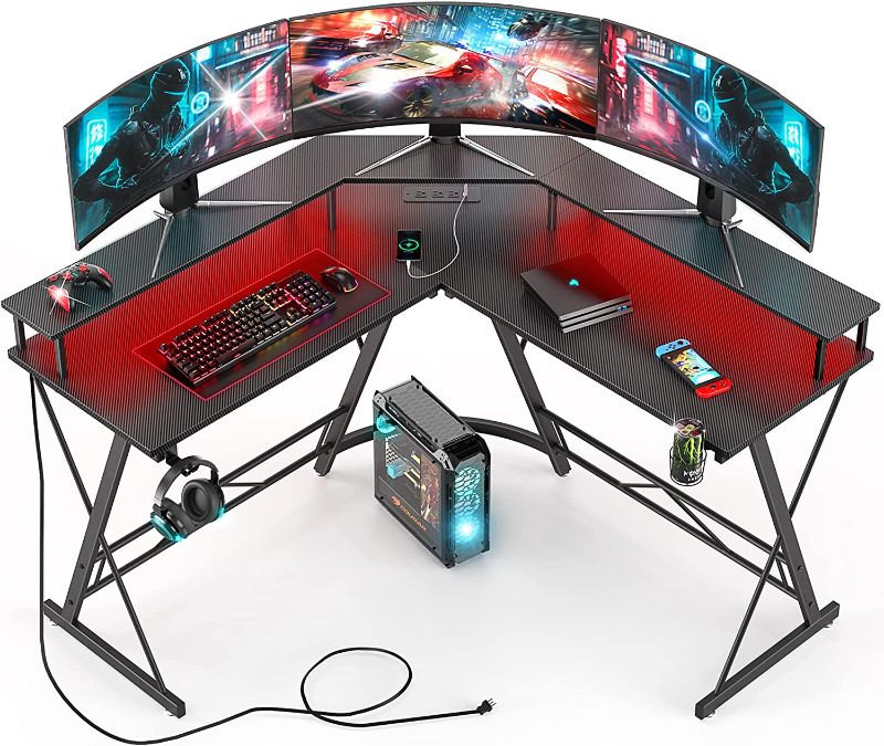 Photo 1 of HYTXEN Gaming Desk with Led Lights, L Shaped Corner Computer Desk with Power Strip, Carbon Fiber Surface Gaming Table with Monitor Stand?Cup Holder Headphone Hook, Graphite Black
