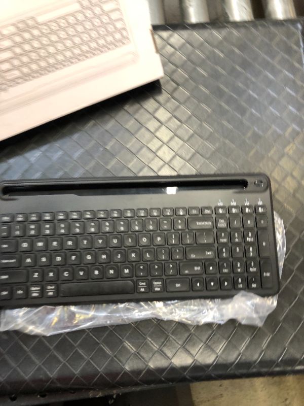 Photo 2 of seenda Multi-Device Bluetooth Backlit Keyboard for Tablet Phone Computer - Wireless Illuminated Rechargeable Keyboard with Number Pad Connect Up to 4 Devices Compatible Mac Android iOS Windows
