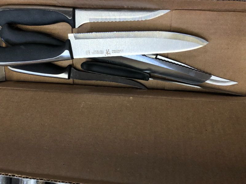 Photo 2 of ZWILLIN100G J.A. HENCKELS KNIFE SET. HEAVILY USED 