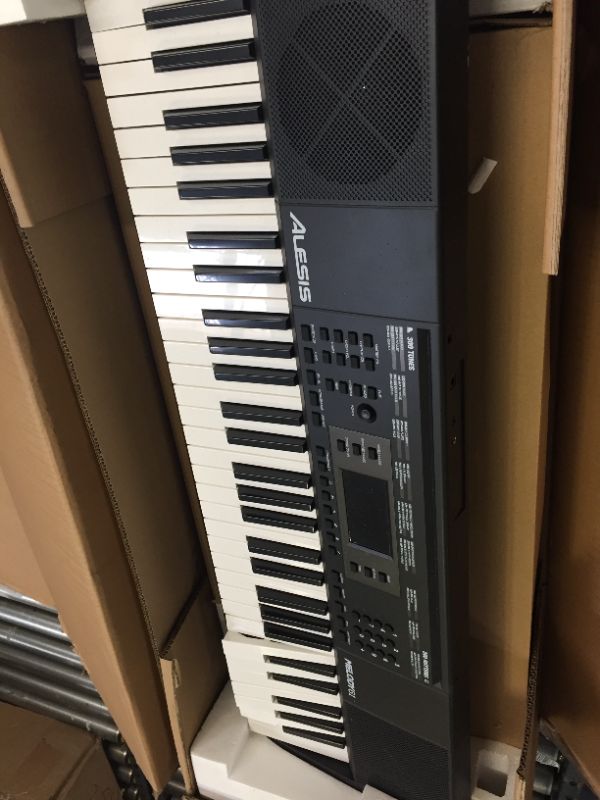 Photo 3 of Alesis Melody 61 Key Keyboard Piano ( parts only) keys broken for Beginners with Speakers, Digital Piano Stand, Bench, Headphones, Microphone, Music Lessons and Demo Songs
