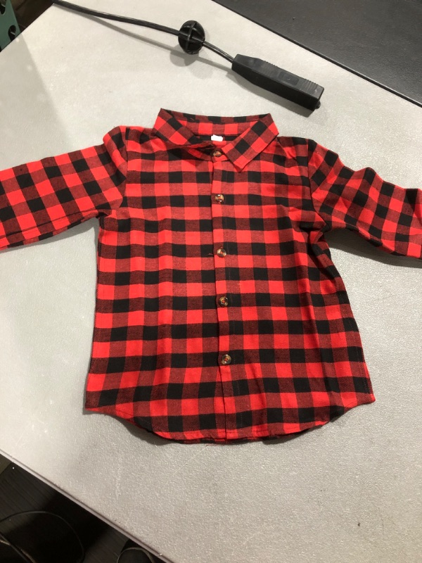 Photo 1 of 7-8 BOYS FLANNEL WITH WRITTING SEE IMAGE