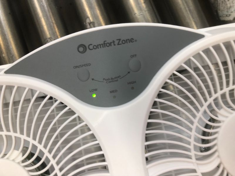 Photo 2 of Comfort Zone 3-Speed 3-Function Expandable Reversible Twin Window Fan with Remote Control, Removable Cover