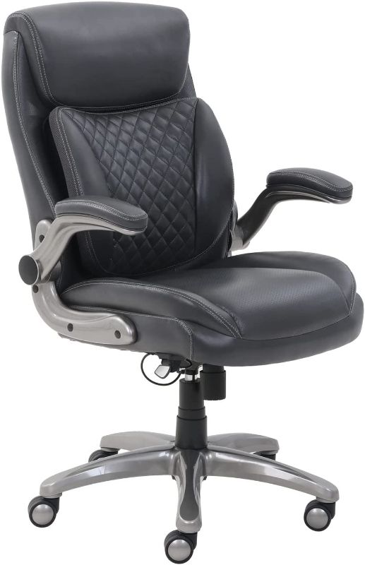 Photo 1 of AmazonCommercial Ergonomic Executive Office Desk Chair with Flip-up Armrests - Adjustable Height, Tilt and Lumbar Support - Black Bonded Leather
