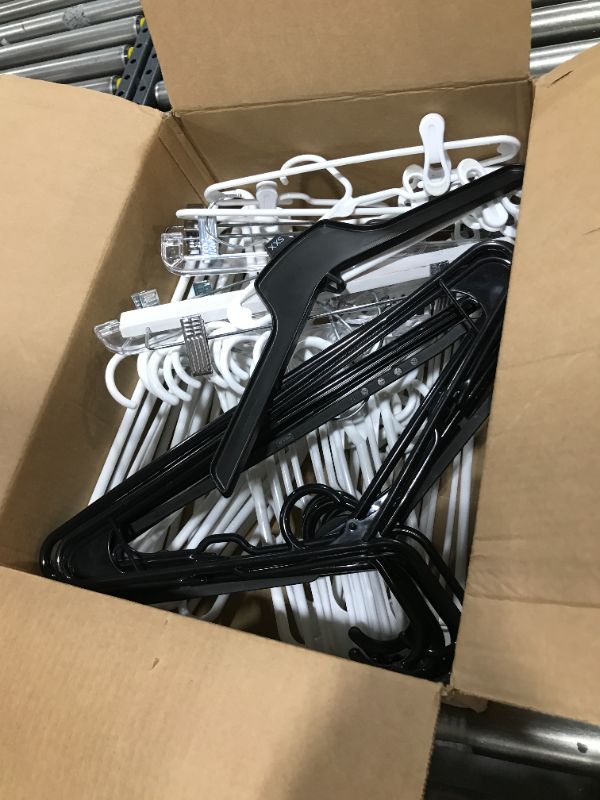 Photo 1 of Assorted Clothes Hangers