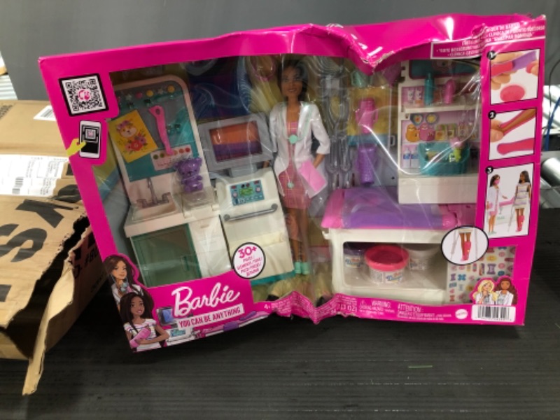 Photo 2 of Barbie Fast Cast Clinic Playset, Brunette Doctor Doll (12-in), 30+ Play Pieces, 4 Play Areas, Cast & Bandage Making, Medical & X-ray Stations, Exam Table