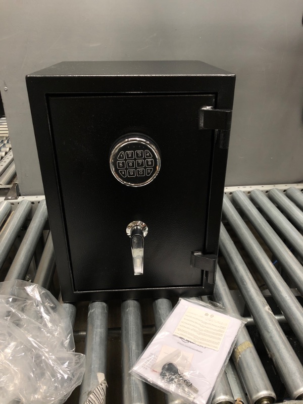 Photo 1 of Amazon Basics Fire Resistant Security Safe with Programmable Electronic Keypad - 0.83 Cubic Feet, 14.17 x 12.2 x 15.75 inches
