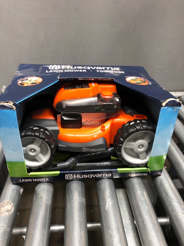 Photo 2 of Husqvarna Battery-Powered Kids Toy Lawn Mower for Ages 3+ Orange