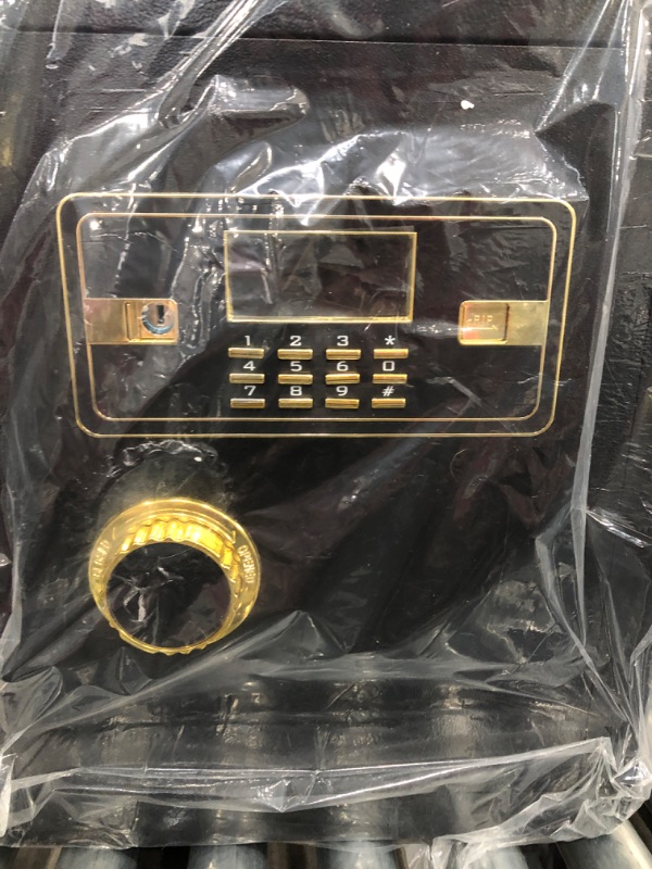 Photo 1 of Electronic Safe with Accessory Bag 
Includes: One Manual, Two Master Lock Keys, Two Emergency Keys, Two Internal Locker Keys, Six Expansion Bolts, External Power Supply Box, and One Money Bag