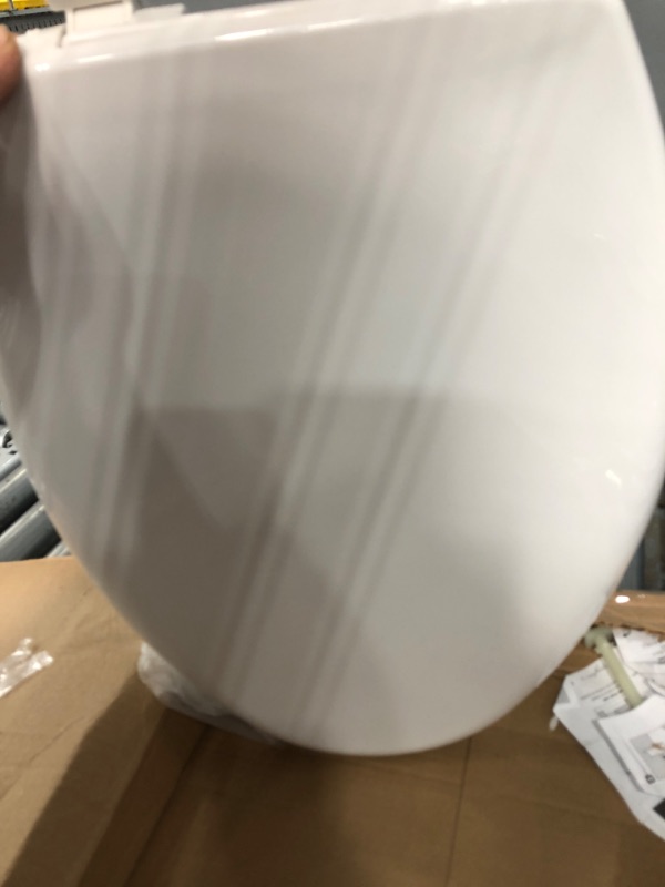 Photo 1 of Affinity Elongated Closed Front Toilet Seat in White