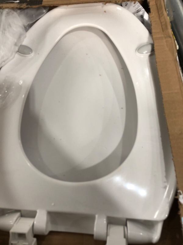 Photo 1 of Affinity Elongated Closed Front Toilet Seat in White