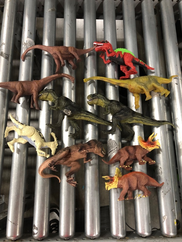 Photo 1 of A pack of 10 dinosaurs