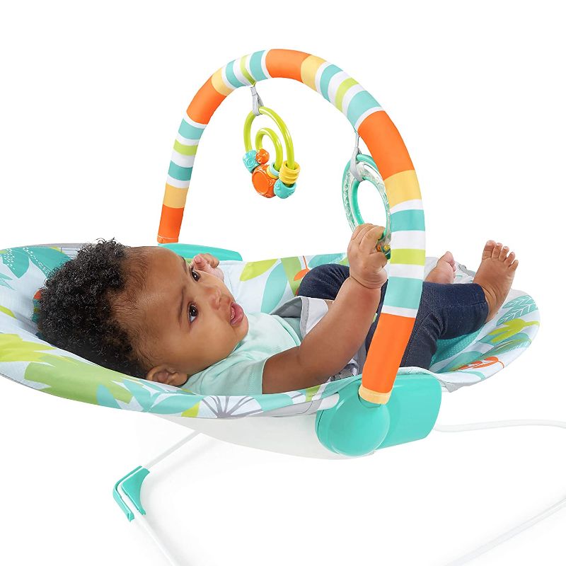 Photo 1 of Bright Starts Rainforest Vibes 3-Point Harness Vibrating Baby Bouncer with -Toy bar
